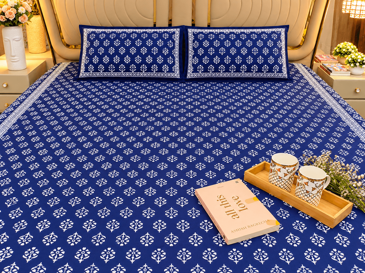 Indigo-blue RESHA bedding with white block-print motifs and matching pillow covers